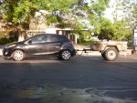 Mazda and trailer in april 14.jpg