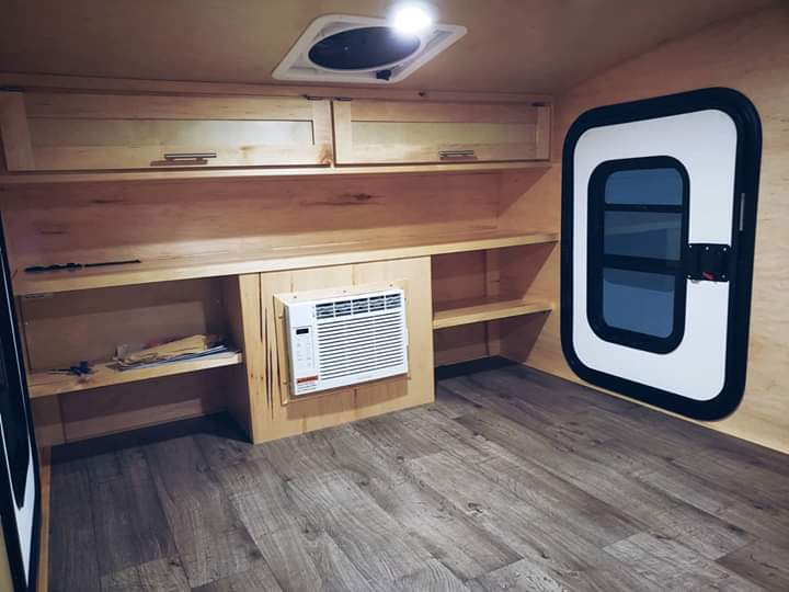 Backcountry Inside Front & View Of Woodgrain Padded Vinyl Flooring.jpg