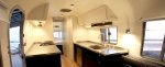 1987-airstream-motorhome-modern-stainless-kitchen-930x375.jpg