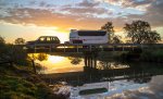 Kimberley-Kruiser-T3-off-road-caravan-On-Bridge-with-reflection-behind.jpg