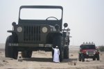 Sheikh_Hamad_bin_Hamdan_Al_Nahyan_with_largest_model_Willys_jeep_2009.jpg