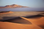 clearing_fog_bank_over_sand_dunes_near_gobabeb_namib_desert_namibia.jpg