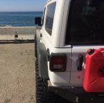 JL tire stick out.jpeg JL tire stick out.jpeg