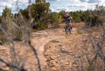 Mountain Biker Descending Slickrock Section of Bull Run Trail.jpg