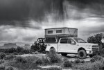 Stormy Skies Over Monitor and Merrimac Buttes and Overlanding Campsite near Moab.jpg