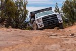 Ford F150 and Four Wheel Camper Squeezing Between Trees on Off-Camber 4x4 Trail-Edit.jpg