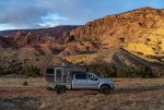 Ford F250 Tremor and Four Wheel Campers Hawk Ute in Profile Under Stormy Sky.jpg