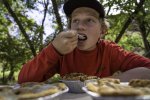 Jackson Edge Eating Apple Pie from Gifford House at Capitol Reef National Park.jpg