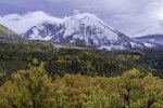 Snow Blankets Haystack Mountain Rising Above a Colorful Autumn Landscape.jpg