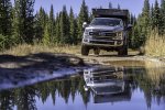 Ford F250 Overland Vehicle Splashes Through Muddy Water in Pothole on Buffalo Park 4x4 Road II.jpg