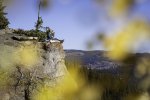 Woman Enjoying Spectacular Views from Cliffside Seat near Steamboat Springs.jpg