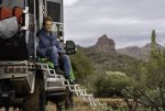 Woman Wrapped in Voited Blanket Enjoying Views from Overland Camper in Superstition Mountains-3.jpg