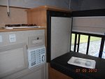 CAMPER INTERIOR - RANGE TOP & FRIDGE AREA.jpg