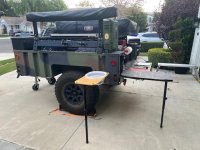Driver side of Trailer with tables deployed.jpg